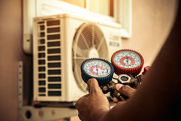 Professional Ac Installation technician working in Newton Center, MA